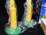 a yellow fire hydrant sitting next to a box of candy