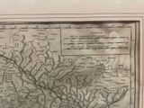 a picture of a map on a wall in a room