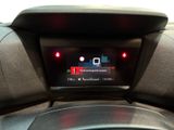 a digital display in the center of a car