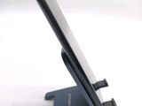 a close up of a cell phone on a stand