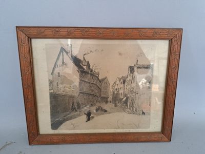 an old picture of a picture of a street in a wooden frame