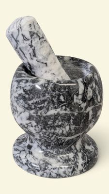marble mortar and pestle set on a white background