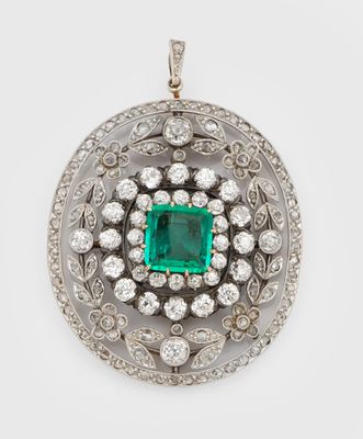 an emerald and diamond pendant