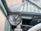 a close up of a gauge on the dashboard of a car