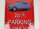 a red sign that says citroen 2v parking only