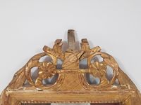 Glace en bois sculpté et doré, fronton ajouré à décor de rin… (photo 2)