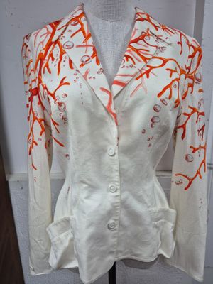 Thierry MUGLER Paris. Veste fermant par 3 pressions, à motif…