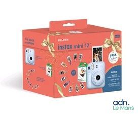 une photo représentant un appareil photo Polaroid blanc dans un coffret cadeau rouge