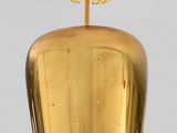 brass pendant light with a flower on the top of it