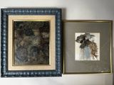 two framed pictures on the wall of a room