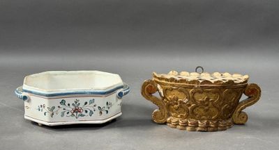 pair of small porcelain dishes with handles and handles in the shape of flowers