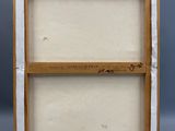 an old picture frame with a piece of wood in it