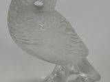 an image of a glass owl figurine on a white background