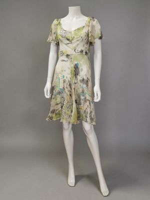 a mannequin wearing a dress with a floral print