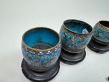 three cups that are sitting on top of each other