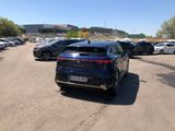many cars parked in a parking lot in a parking lot