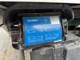 a blue label on the back of a vehicle