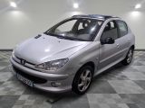 a picture of a silver car parked in a garage