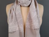 a close up of a scarf on a mannequin mannequin
