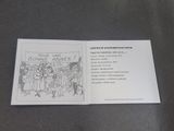 an open book with a drawing of people on it