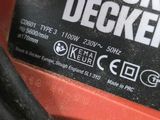 black and decker electric corded sander in use