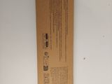 the back of a cardboard box with a picture of a cell phone inside of it