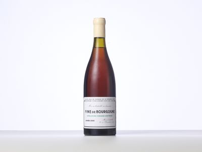 a bottle of wine that is sitting on a table