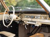 a car dashboard with a steering wheel and a dash board