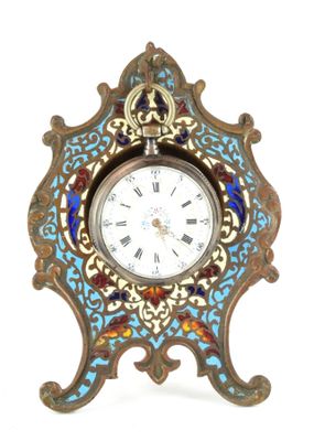 une image représentant une horloge bleue et dorée posée sur une table