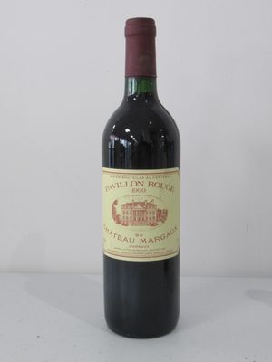 a bottle of wine that is sitting on a table