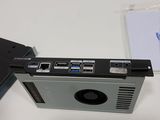 two laptops that are connected to each other on a table