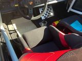 a car with a steering wheel and a seat in it