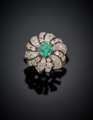 an emerald and diamond ring