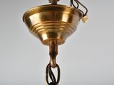 a light that is hanging from the ceiling in the room