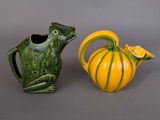 two vases that are sitting next to each other