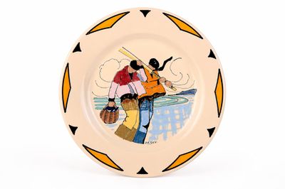 a plate with a picture of a man and a woman on it