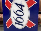 a close up of a sign on a stand in a room