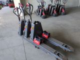 many different types of forklifts in a warehouse