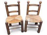 pair of antique wooden chairs with wooden seat and back