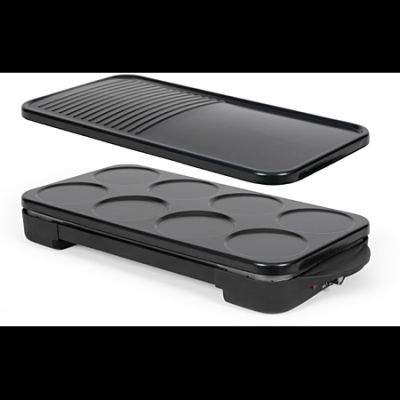 un plateau noir sur lequel est posée une plaque de cuisson et un plateau noir sur lequel est posée une plaque de cuisson