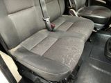 a picture of a car seat with a cup holder in it