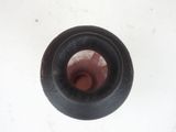 a close up view of a tire on a white surface