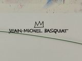 a picture of a surfboard with the name jean michel basquiat on it