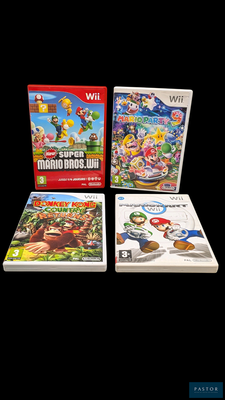 trois jeux Nintendo Wii posés les uns à côté des autres sur une surface noire