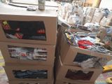 several cardboard boxes stacked on top of each other in a room