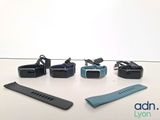 a lot of gadgets that are sitting on a table