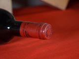 a bottle of wine that is sitting on a table
