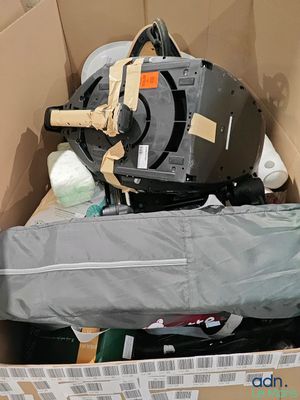 a cardboard box with a bunch of items inside of it