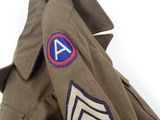 a close up of a military jacket with a patch on it