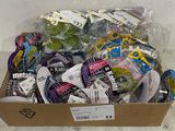 a cardboard box filled with assorted items on the floor